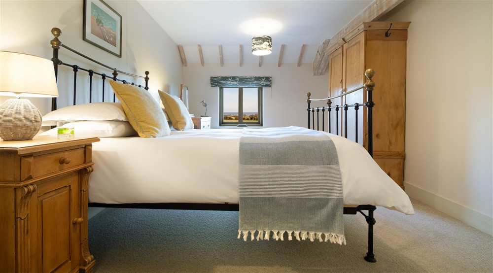 The double bedroom at 4 Cart Lodge Barn in Upper Sheringham, Norfolk