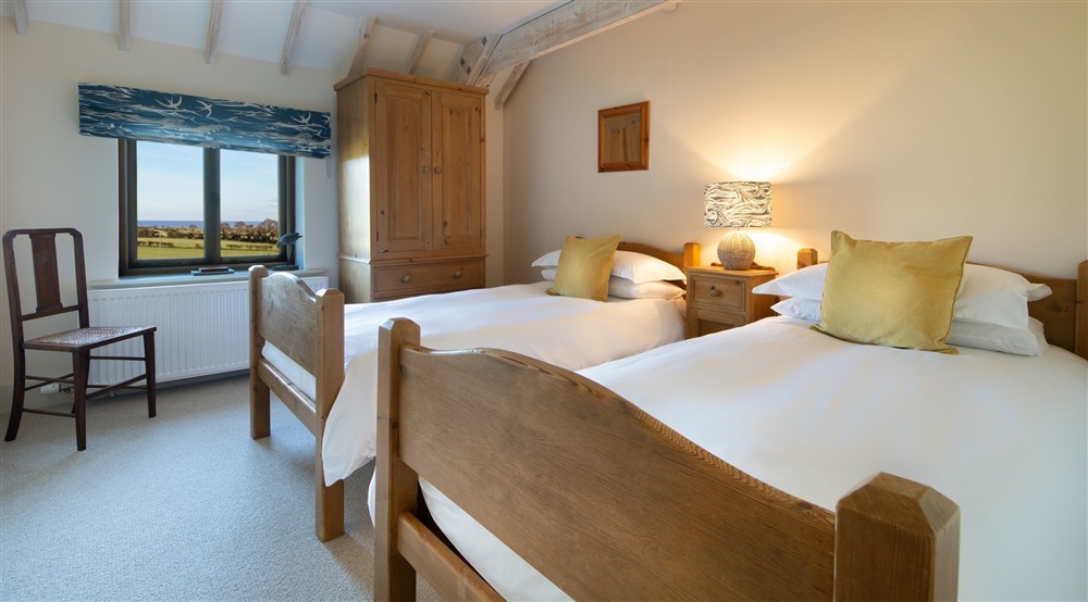 The second twin bedroom at 4 Cart Lodge Barn in Upper Sheringham, Norfolk