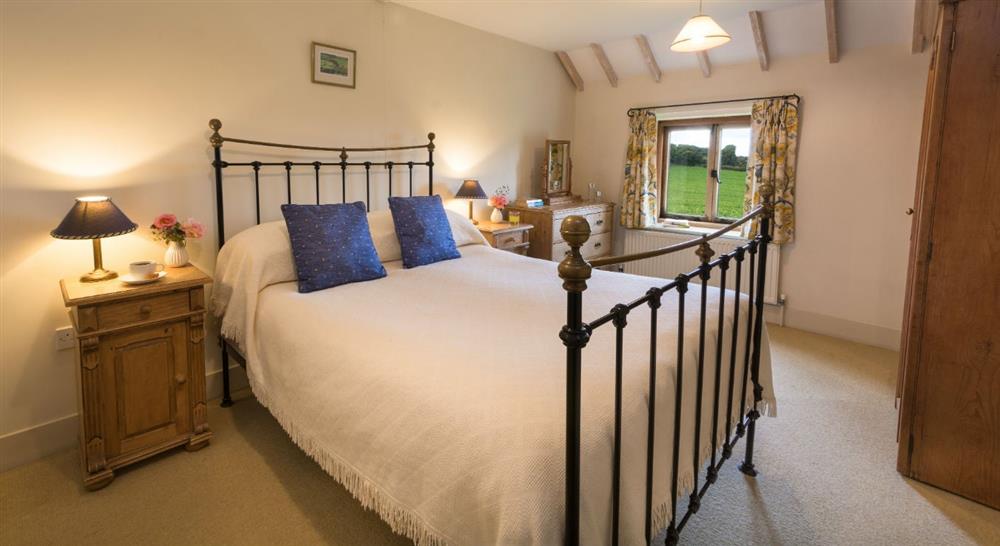 The spacious double bedroom at 4 Cart Lodge Barn in Upper Sheringham, Norfolk