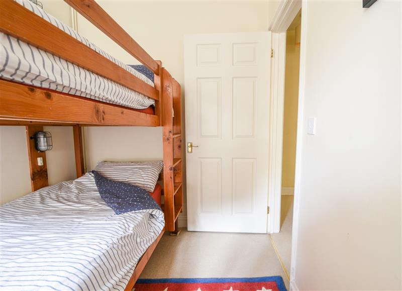 This is a bedroom (photo 2) at 4 Charmouth House, Charmouth
