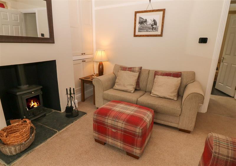 Relax in the living area at 4 Cherry Tree Cottages, Bradwell