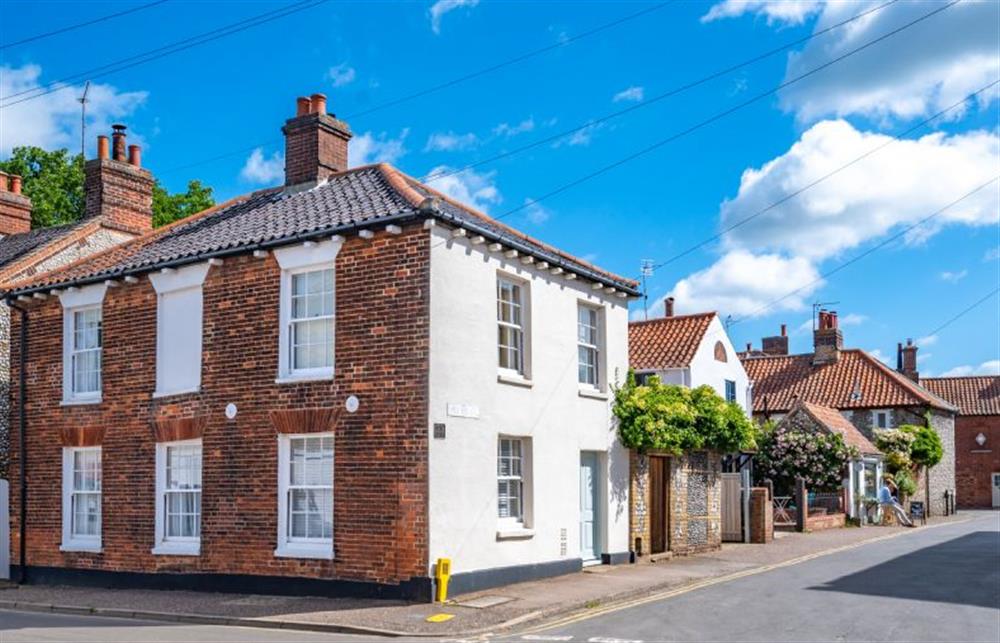 A detached, brick and flint Georgian bolthole, nestled in the heart of Holt at 4 Cross Street, Holt