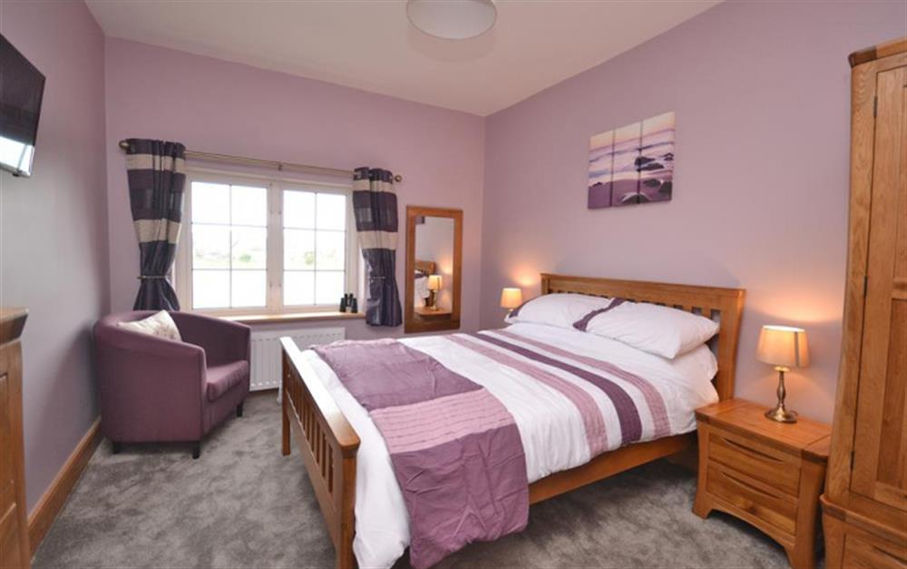 The double bedroom with waterside views at 4 Florence Cottages in Torcross