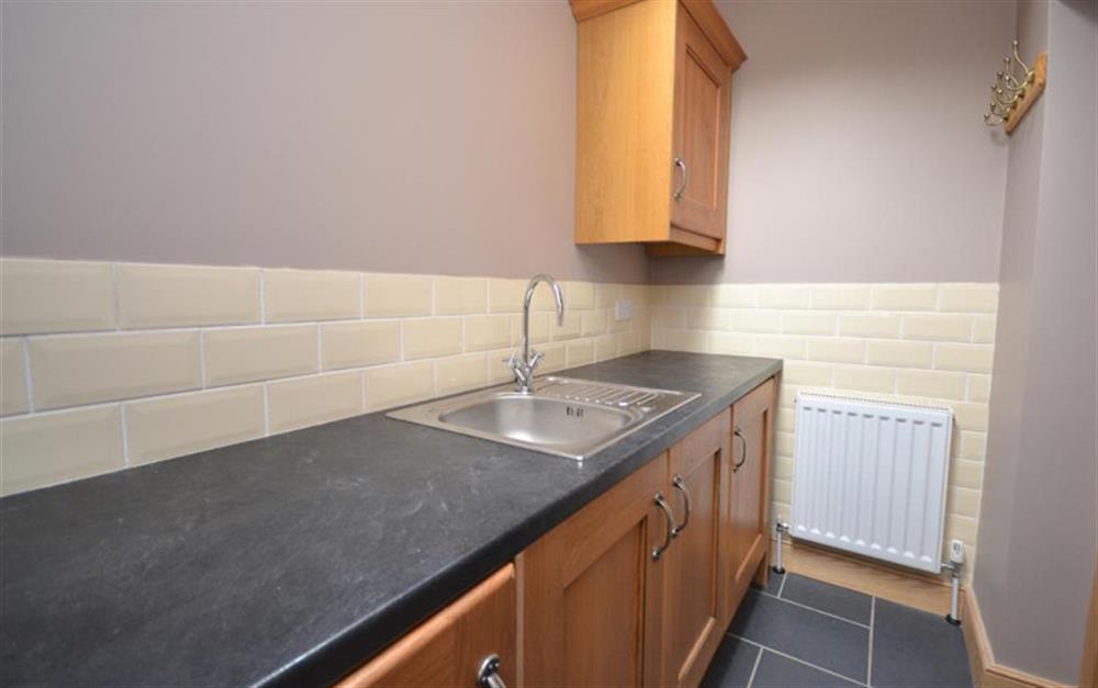 The utility room at 4 Florence Cottages in Torcross
