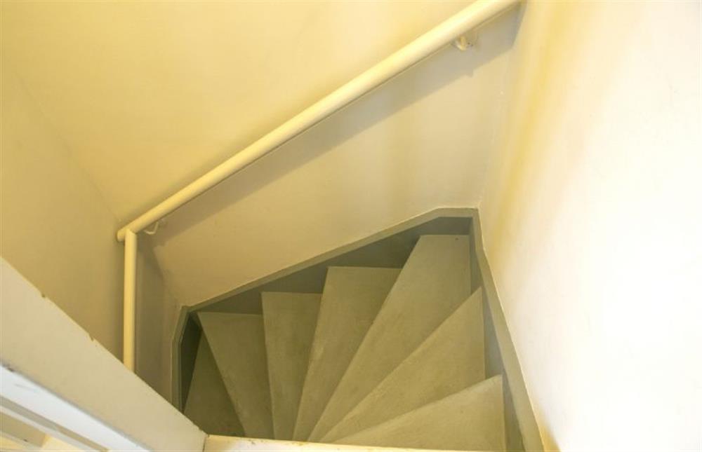 First floor: Steep narrow stairs down to ground floor at 4 Gravel Hill, Burnham Overy Town near Kings Lynn
