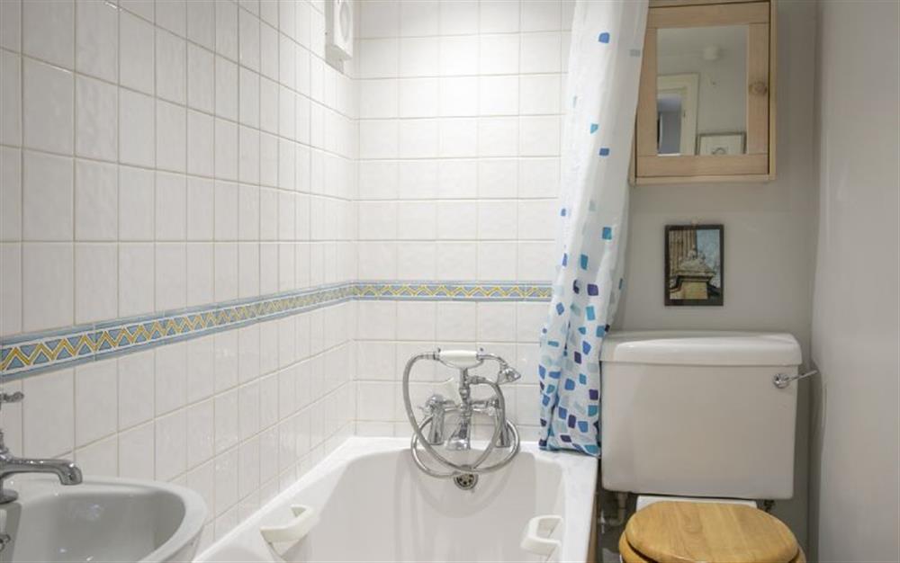 Ground floor: Bathroom with handheld shower at 4 Gravel Hill, Burnham Overy Town near Kings Lynn