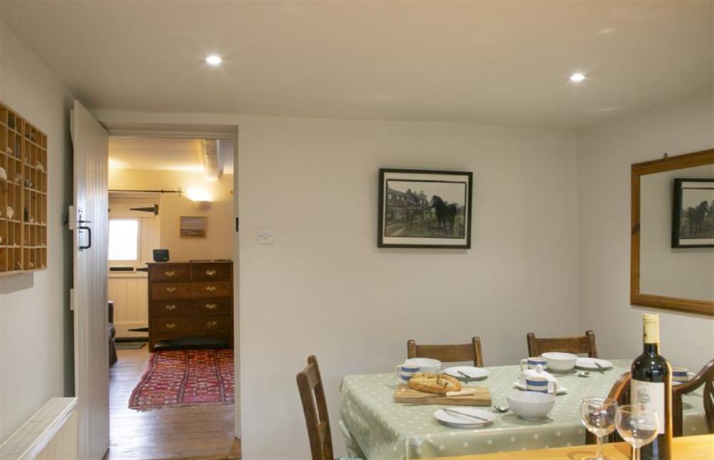 Ground floor: Kitchen leading to sitting room at 4 Gravel Hill, Burnham Overy Town near Kings Lynn