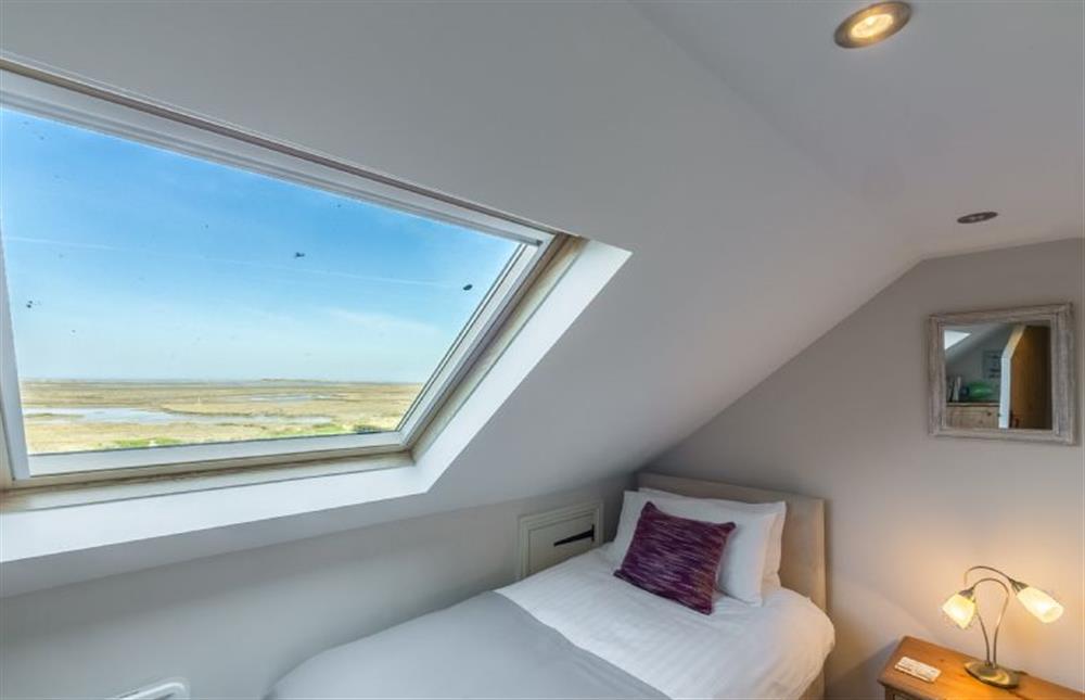 Second floor: Bedroom Three, twin room with marsh views at 4 Harbour View, Brancaster Staithe near Kings Lynn