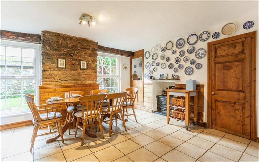 The dining area within the kitchen with views onto the garden. at 4 Kings Quay in Dartmouth