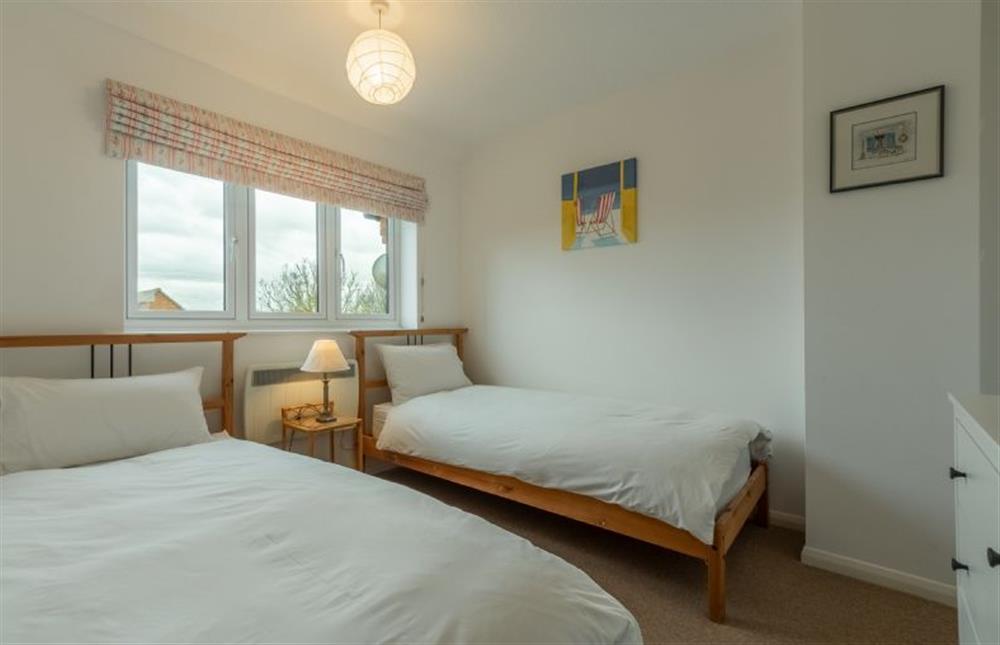 First floor: Bedroom three, full size twin beds at 4 Langford Cottages, Ringstead near Hunstanton