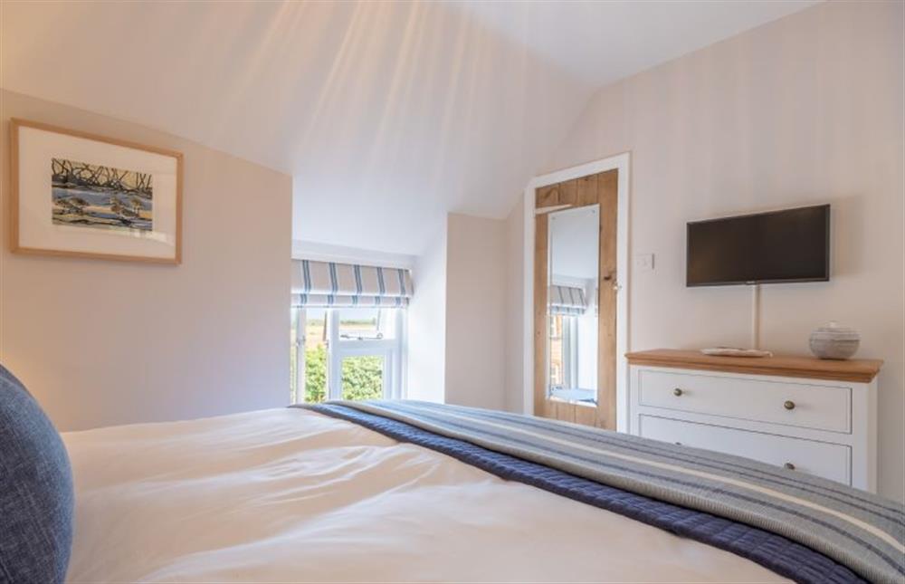 First floor:  Bedroom two with king-size bed (photo 3) at 4 Malthouse Cottages, Thornham near Hunstanton