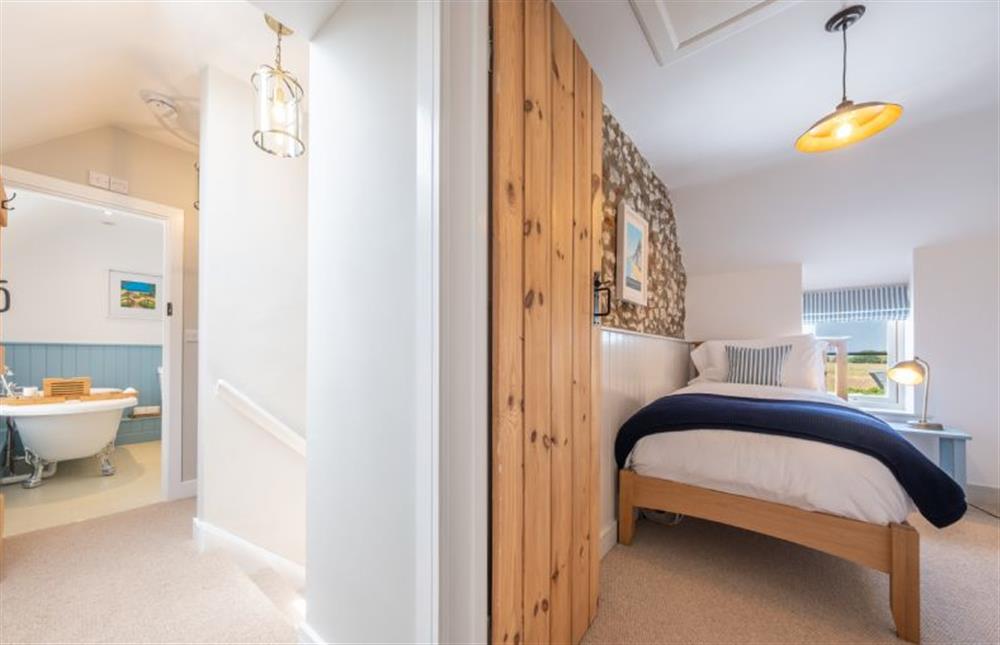 First floor:  Landing area with bathroom and bedroom three at 4 Malthouse Cottages, Thornham near Hunstanton