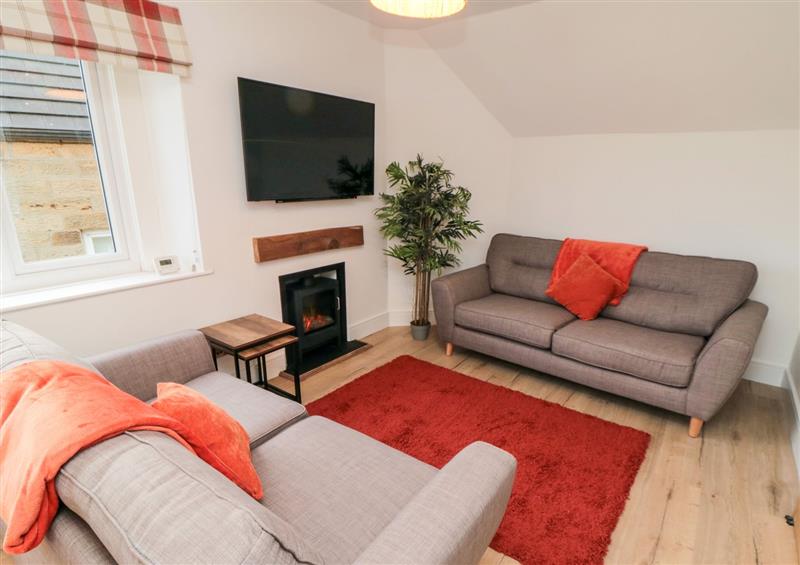 Relax in the living area at 4 Maypole Green, Fylingthorpe
