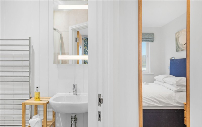 A photo of the bedroom at 4 Out Of The Blue, Devon