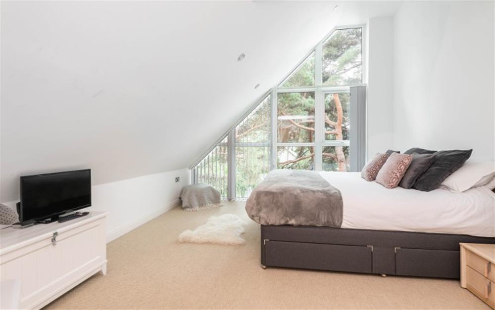 Third Floor Bedroom with front aspect with en-suite (photo 2) at 4 Red Sails in Sandbanks
