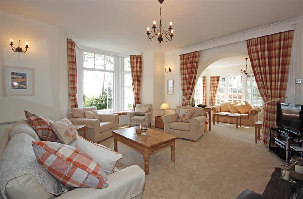 An attractive reception room with two distinct sitting areas. (photo 3) at 4 Ringrone in , Salcombe