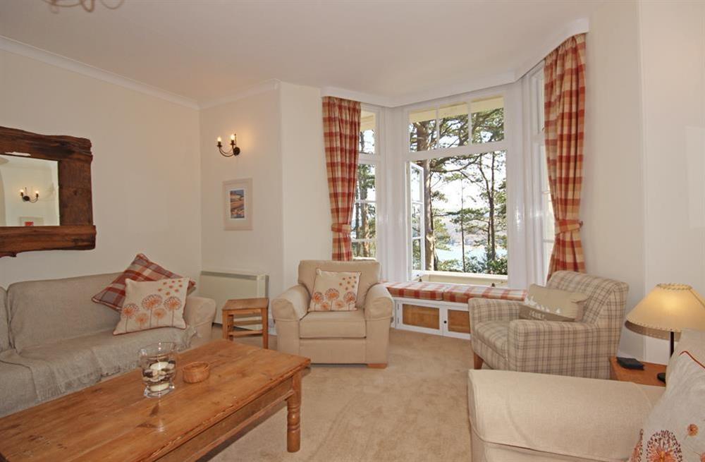 An attractive reception room with two distinct sitting areas.