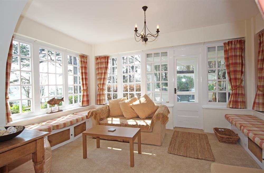 An attractive reception room with two distinct sitting areas at 4 Ringrone in , Salcombe