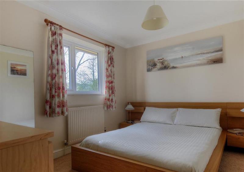 One of the bedrooms at 4 Riverside Cottages, Charmouth