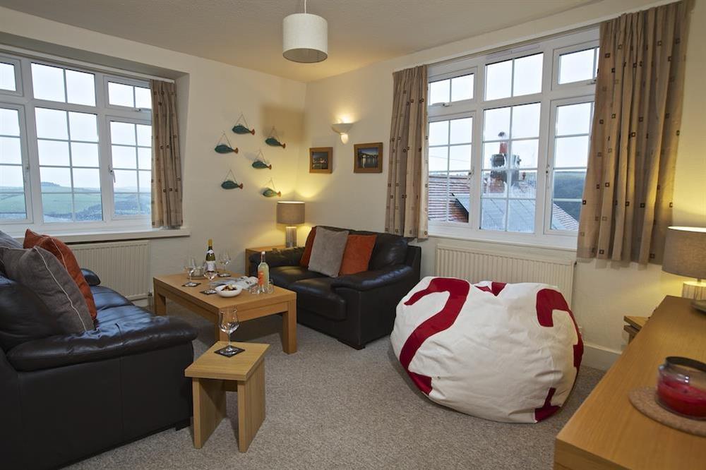 Living area with sofa seating for four and a bean bag at 4 Stonehanger in , Salcombe