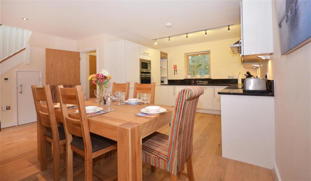 The kitchen and dining area at 4 Talland in Talland Bay
