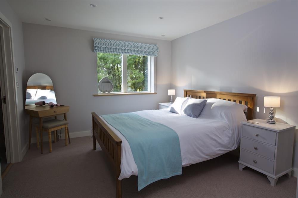 A third en suite also has a King-size bed at 4 The Drive, Hillfield Village in , Hillfield, Dartmouth