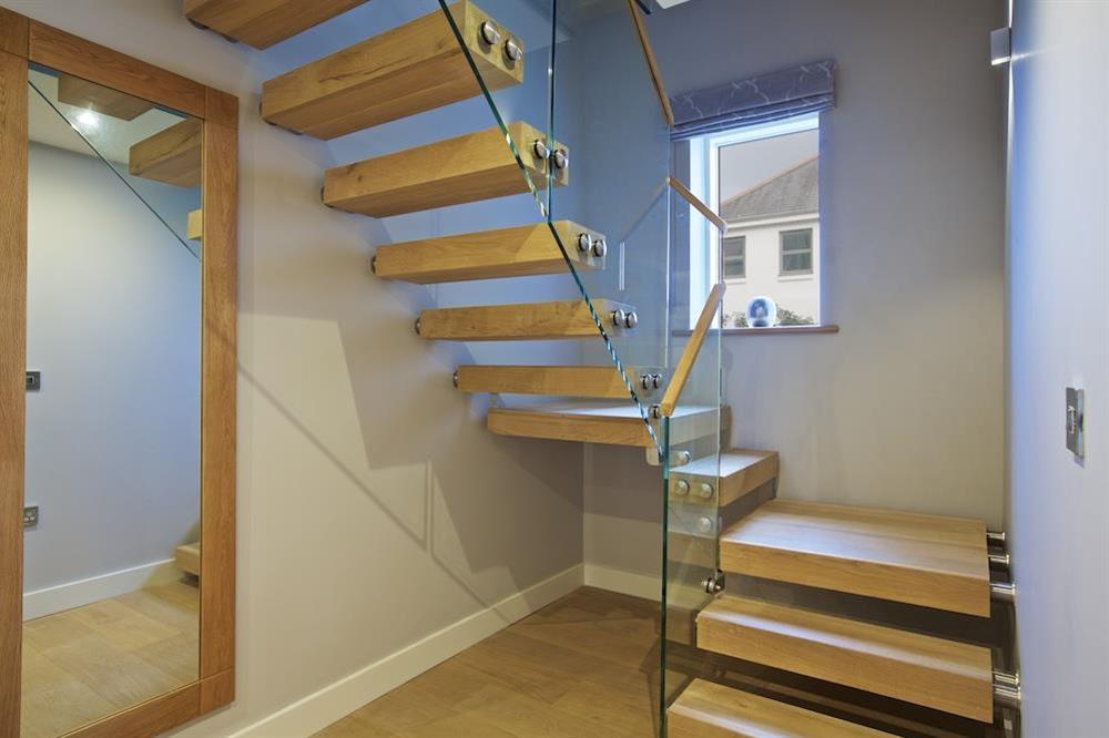 Beautiful oak and glass stairs up to the first floor bedrooms at 4 The Drive, Hillfield Village in , Hillfield, Dartmouth