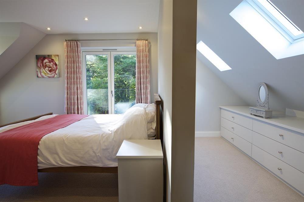 Double bedroom on the top floor with separate dressing area (behind dividing wall) at 4 The Drive, Hillfield Village in , Hillfield, Dartmouth