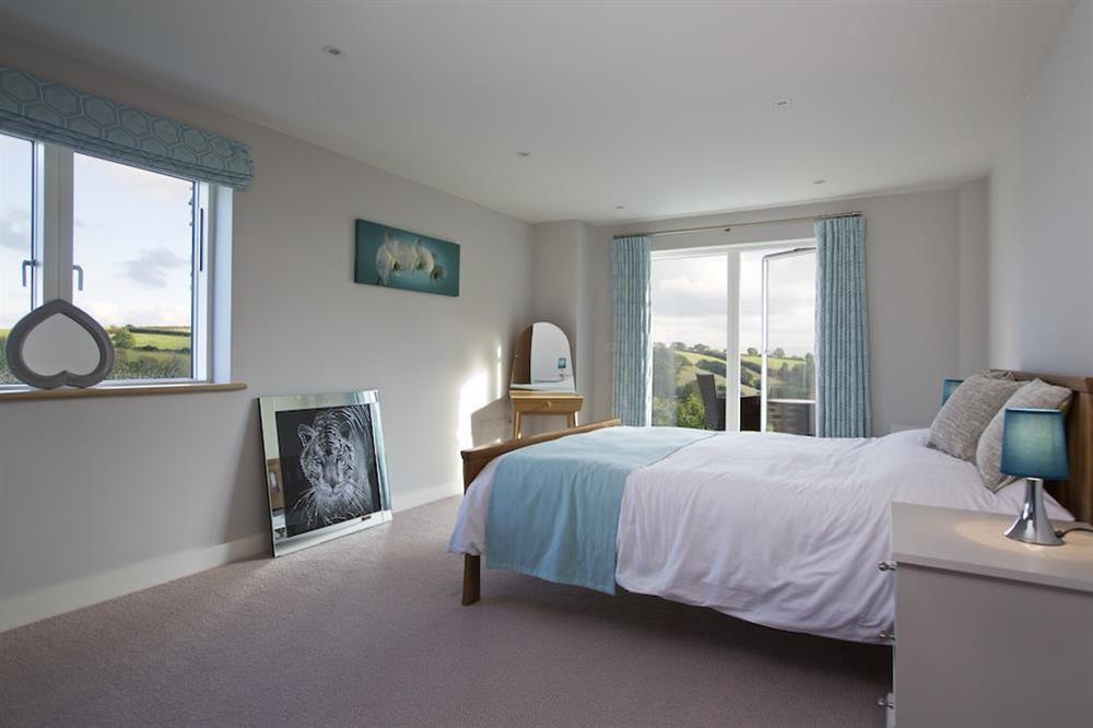 En suite bedroom with balcony and stunning valley views at 4 The Drive, Hillfield Village in , Hillfield, Dartmouth