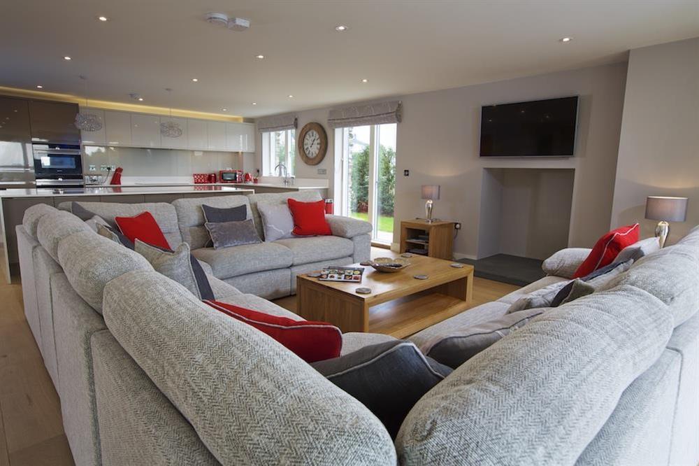 Luxurious, open plan living accommodation with horse-shoe style sofas seating ten (photo 3) at 4 The Drive, Hillfield Village in , Hillfield, Dartmouth