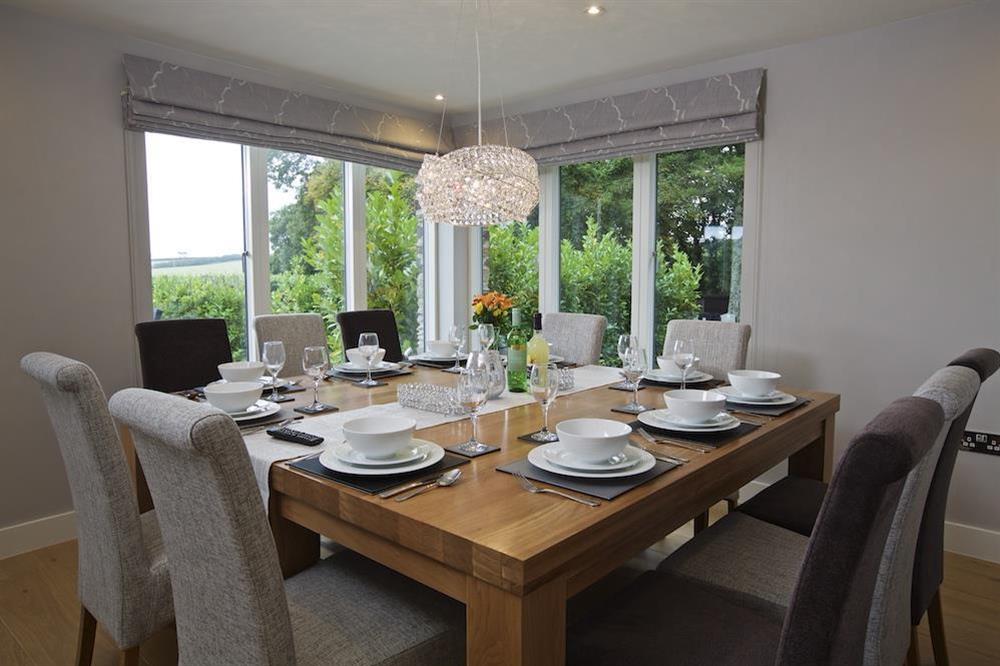 Spacious dining area seating ten guests comfortably (photo 2) at 4 The Drive, Hillfield Village in , Hillfield, Dartmouth