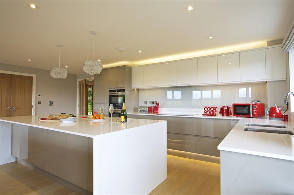 Stylish kitchen with breakfast bar and central island at 4 The Drive, Hillfield Village in , Hillfield, Dartmouth