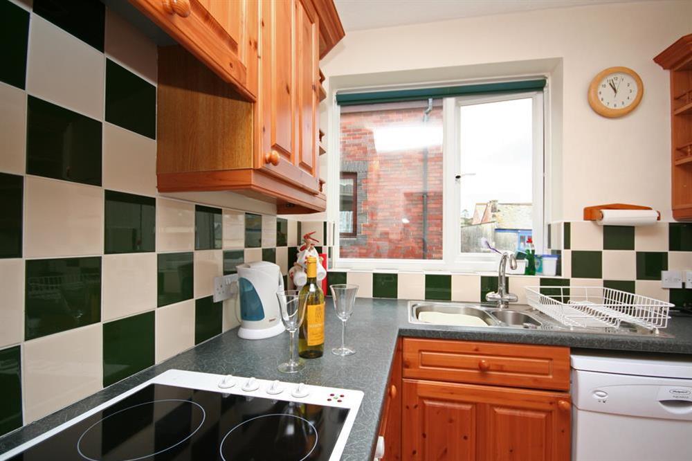 Fully equipped kitchen at 4 Waters Edge in Thorning Street, Salcombe