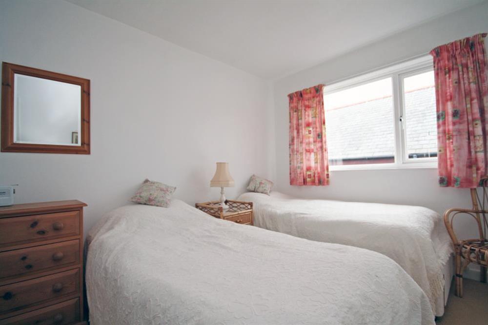 Second bedroom with twin beds at 4 Waters Edge in Thorning Street, Salcombe