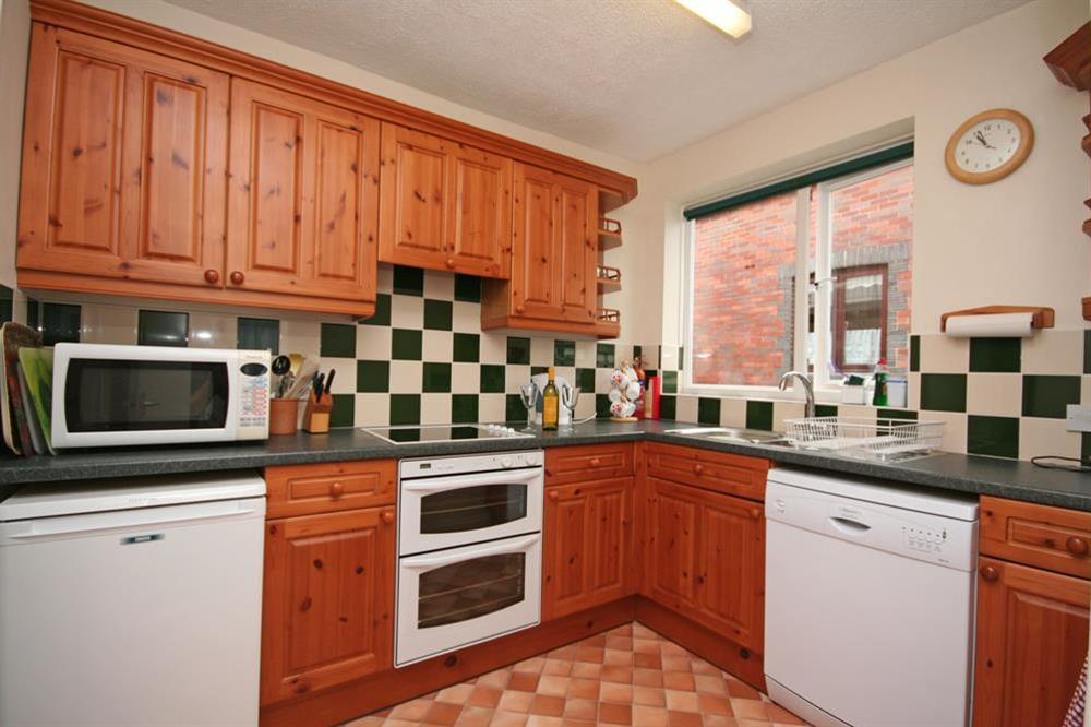 Spacious kitchen at 4 Waters Edge in Thorning Street, Salcombe