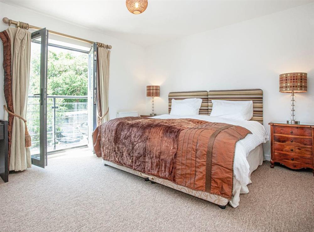 Double bedroom at 4 Waterwheel Apartment in Charlestown, Cornwall