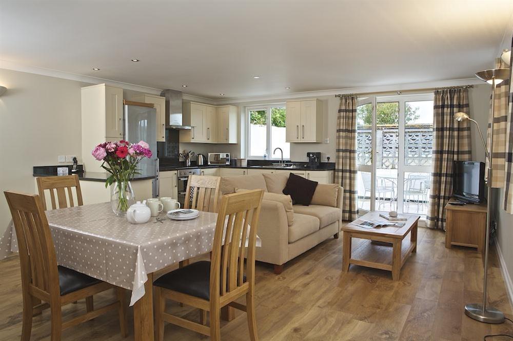 Spacious open plan lounge, dining and kitchen area at 4 West Park Mews in Hope Cove, Kingsbridge