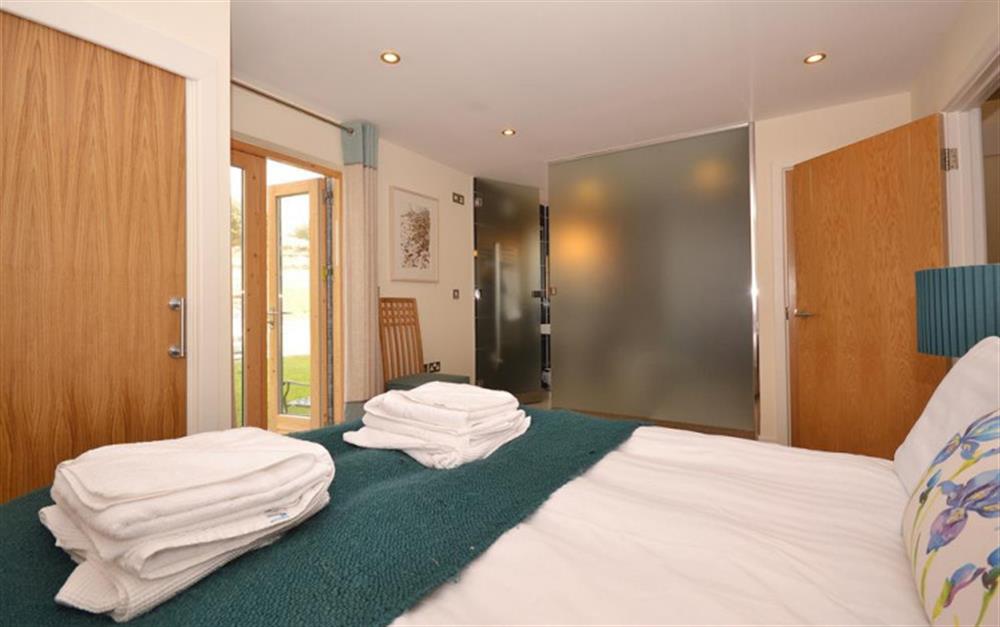 Another view of the master bedroom, showing the en suite at 42 Talland in Talland Bay