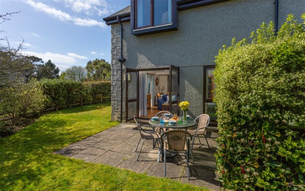 The private patio is perfect for al fresco dining. at 44 Upper Stables in Maenporth