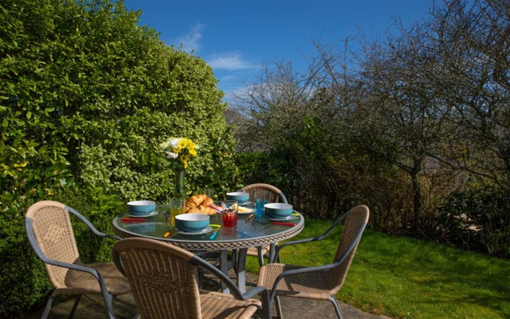 The stylish patio furniture is ideal for al fresco eating. at 44 Upper Stables in Maenporth