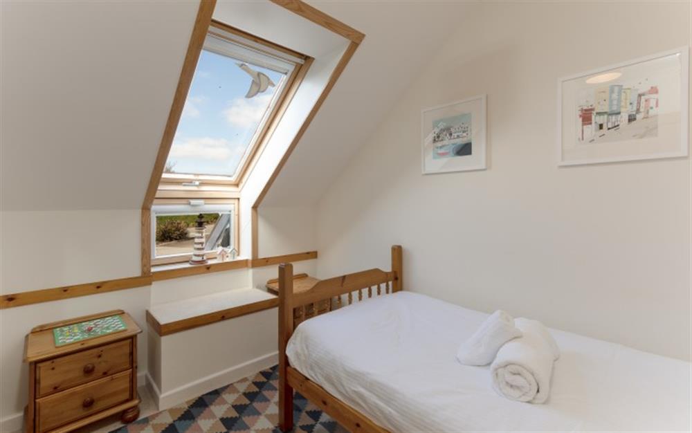 The third bedroom has a single bed.  The windows allow plenty of light in. at 44 Upper Stables in Maenporth