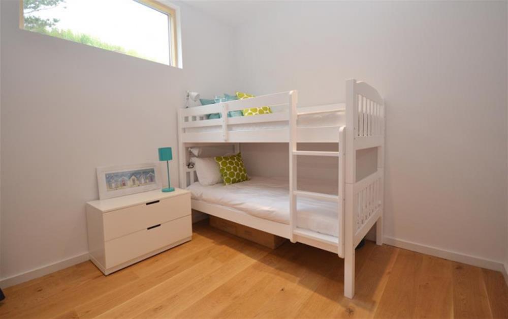 Part of the childrens room, showing one bunk bed,