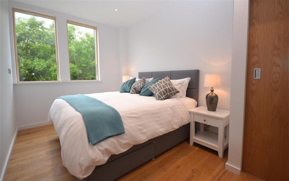 The third double super king bedroom with en suite at 45 Talland in Talland Bay