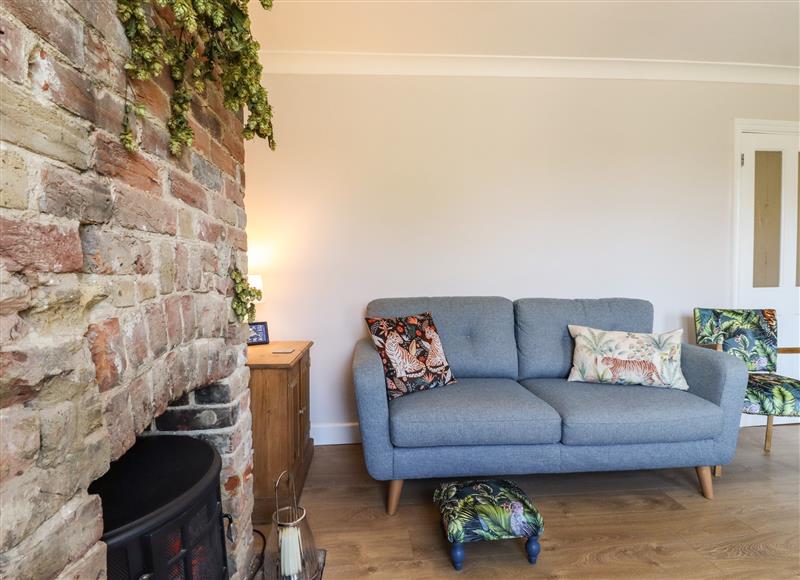 Relax in the living area at 46 By The Creek, Faversham