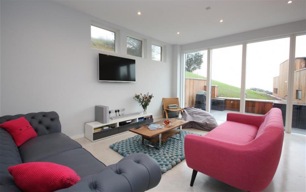 The generous open plan living room at 46 Talland in Looe