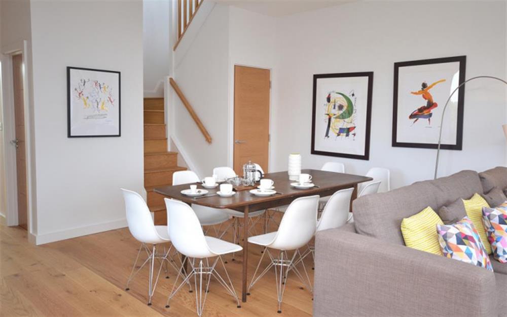 Dining area with stairs leading to the roof terraces. at 47 Talland in Looe