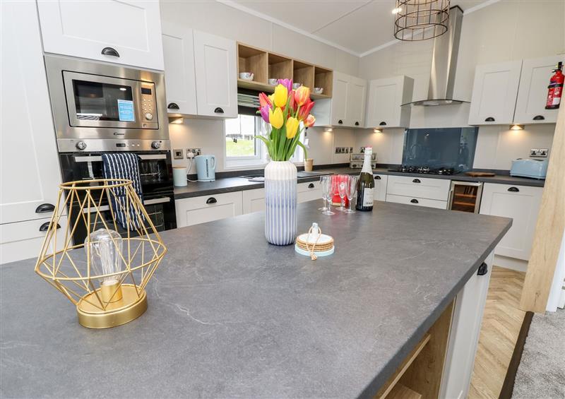 This is the kitchen at 48 Crosswinds, Bembridge