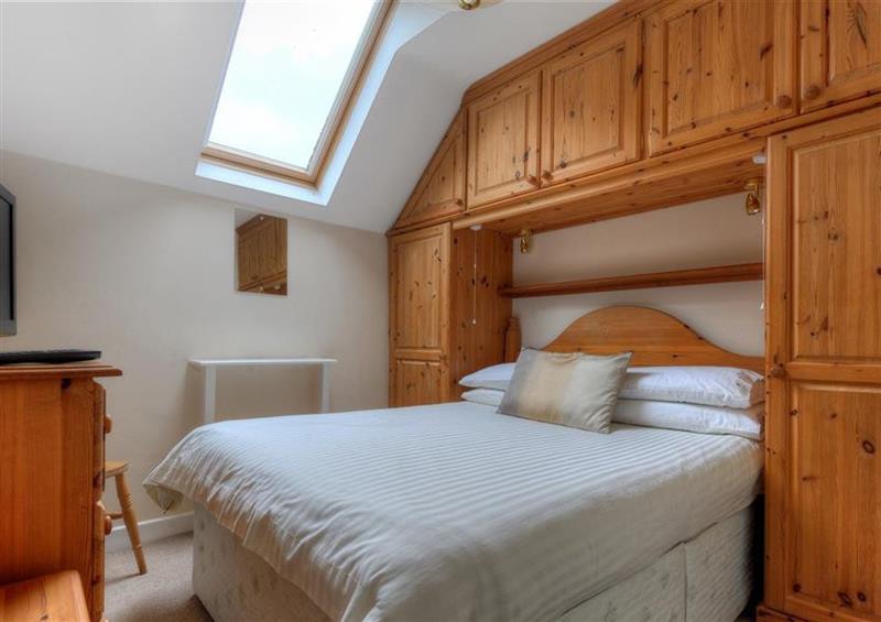One of the bedrooms at 48 Fernhill Heights, Charmouth