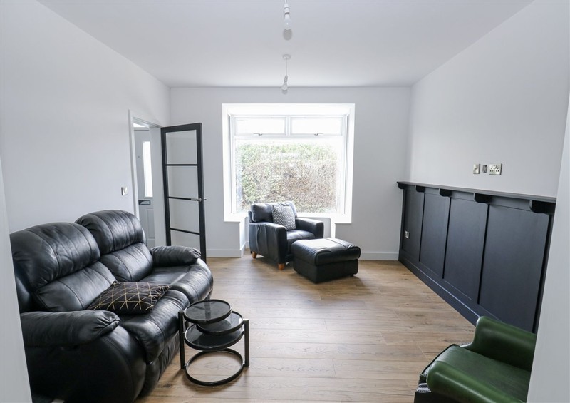 Relax in the living area at 489 New Hey Road, Huddersfield