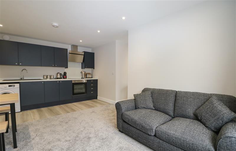 Enjoy the living room at 4A One Bed Apartment with patio and private entrance, Seaford
